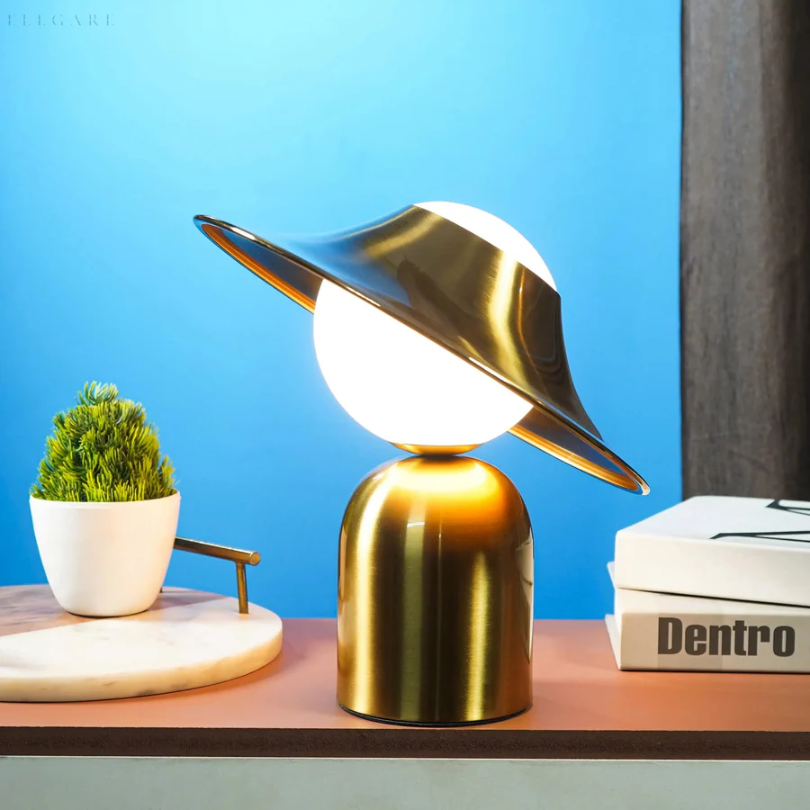 Sleek Gold-Colored Tilted Head Metal Warm Glow Table Lamp
