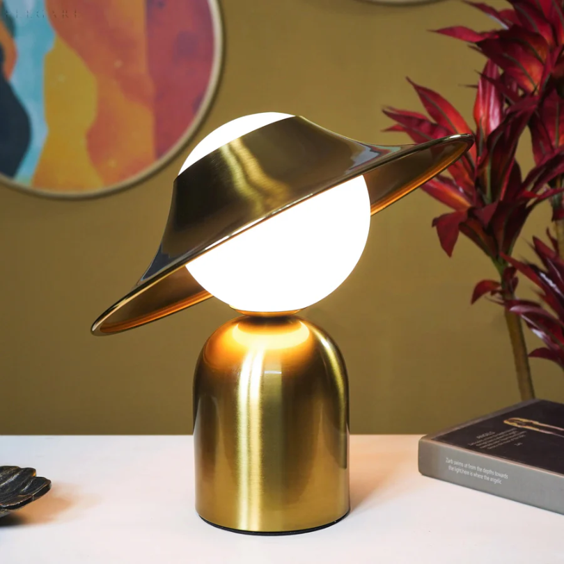 Sleek Gold-Colored Tilted Head Metal Warm Glow Table Lamp