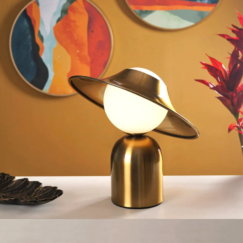 Sleek Gold-Colored Tilted Head Metal Warm Glow Table Lamp